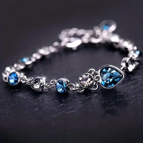 Silver-Tone Blue Crystal Heart Charm Bracelet