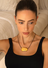 Gold Oval Pendant Necklace with Black Leather Cord
