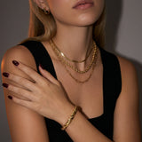 Gold Twisted Center Bangle Bracelet with Secure Clasp