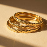 Gold Twisted Center Bangle Bracelet with Secure Clasp