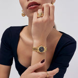Gold Stainless Steel Analog Wristwatch with Black Dial