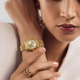 Gold Stainless Steel Analog Wristwatch with Champagne Dial