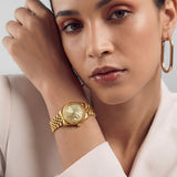 Gold Stainless Steel Analog Wristwatch with Champagne Dial